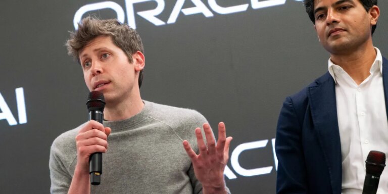 A reported OpenAI IPO later this year that will test investor tolerance for the AI boom’s cash bonfire Sam Altman speaking into a mic.