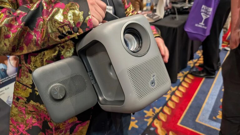 Anker P1i with one speaker panel opened, looking like an elephant ear.