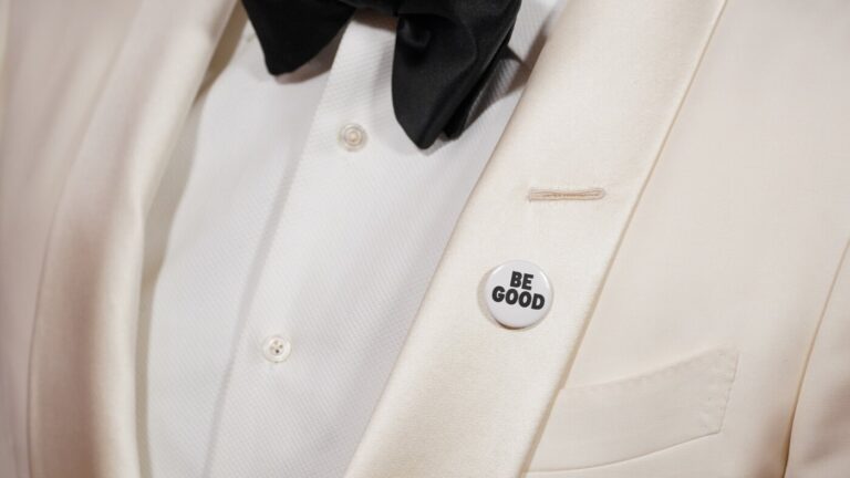 Celebrities wear pins protesting ICE at the Golden Globes : NPR