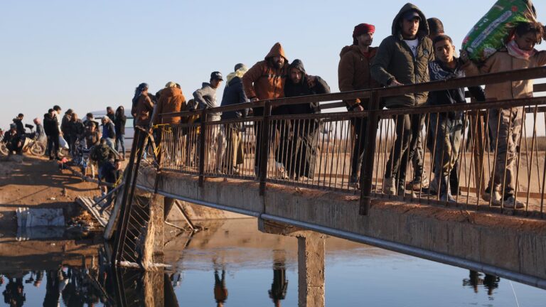 Civilians flee on foot as Syrian military offensive looms east of Aleppo