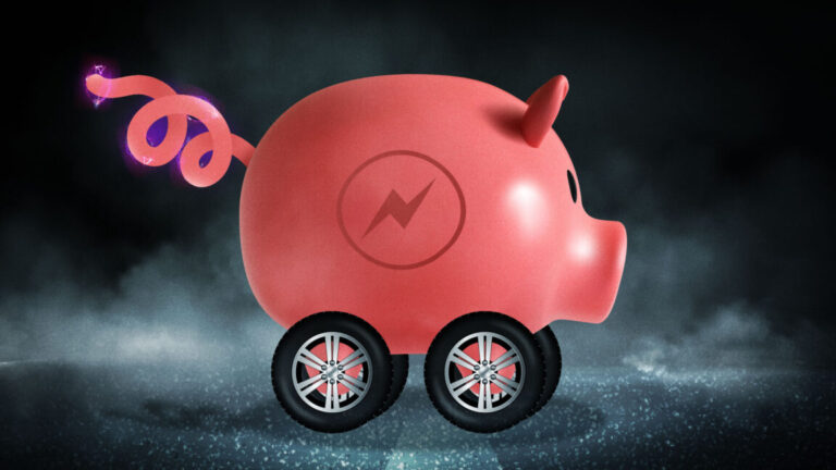 A piggy bank with wheels and an electricity sign on its flank