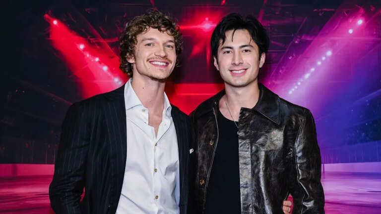Connor Storrie and Hudson Williams attend the premiere of Heated Rivalry at TIFF Lightbox on November 24, 2025 in Toronto, Ontario.