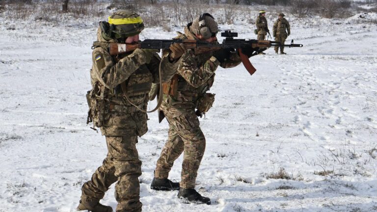 Ukraine endures a bitter winter after Russian attacks as peace efforts overshadowed