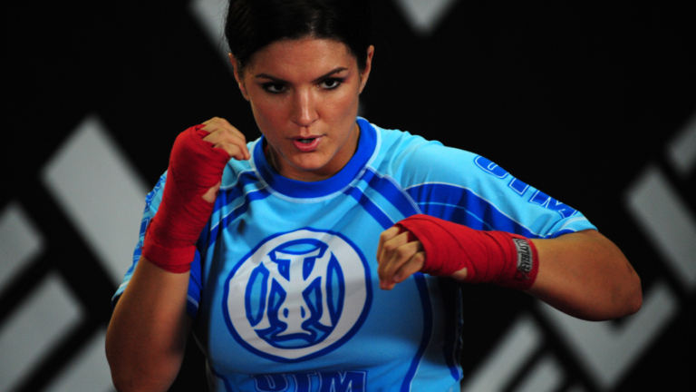 Netflix Un-Cancels Gina Carano for MMA Fight With Ronda Rousey Netflix Un-Cancels Gina Carano for MMA Fight With Ronda Rousey