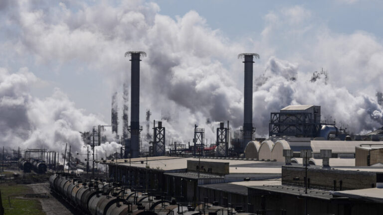 Steam rises from one of the plants near the Houston Ship Channel.