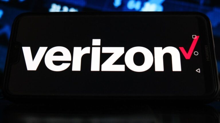 Illustration with a Verizon logo on a smartphone screen and a stock market graphic in the background.