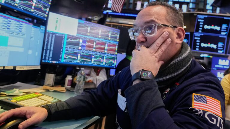 Wall Street opens lower after markets rally in Asia