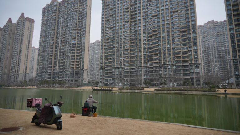 As China's economy slows, some are snapping up cheap apartments to 'retire' early