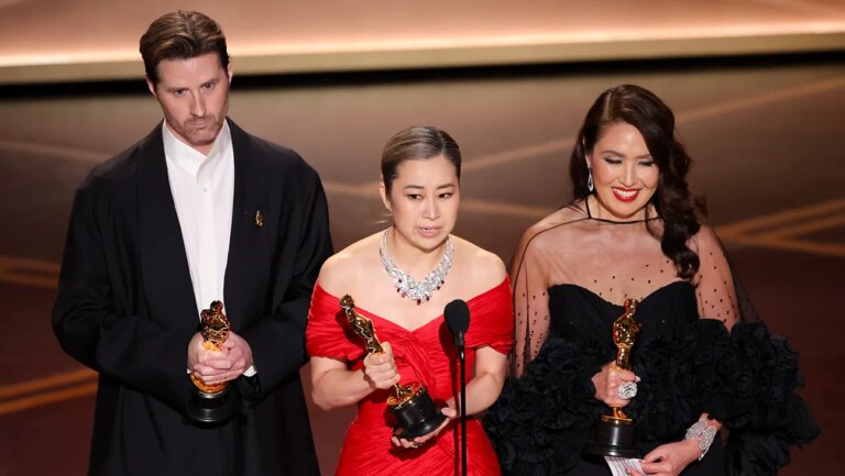 K-Pop Demon Hunters, BTS, and How Korea Conquered American Culture Chris Appelhans, Maggie Kang and Michelle Wong at the 98th Annual Oscars held at Dolby Theatre on March 15, 2026 in Hollywood, California.