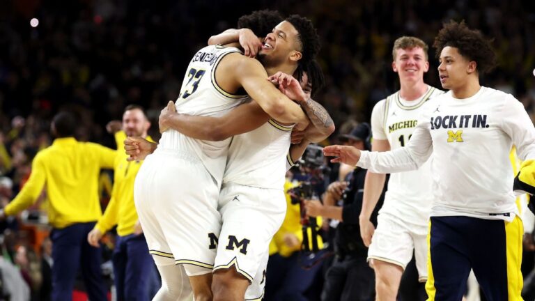 Michigan holds off UConn, wins second NCAA basketball title Michigan holds off UConn, wins second NCAA basketball title